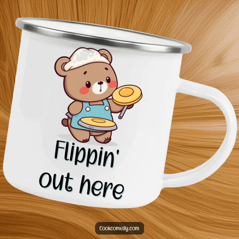 Funny camping mug with a busy bear chef in an apron, flipping a pancake, built for adventure.
