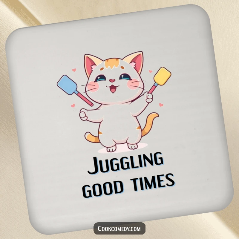 Funny coaster featuring a playful cat juggling colorful spatulas, protecting surfaces with charm and humor.