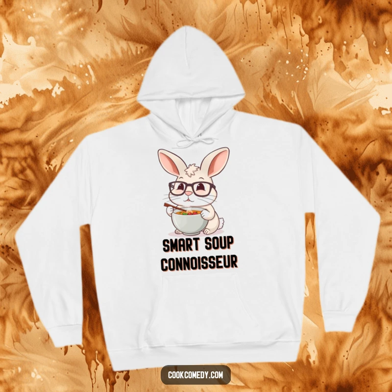 Funny rabbit chef with large glasses tasting a tiny bowl of hot soup, printed on a warm hoodie.